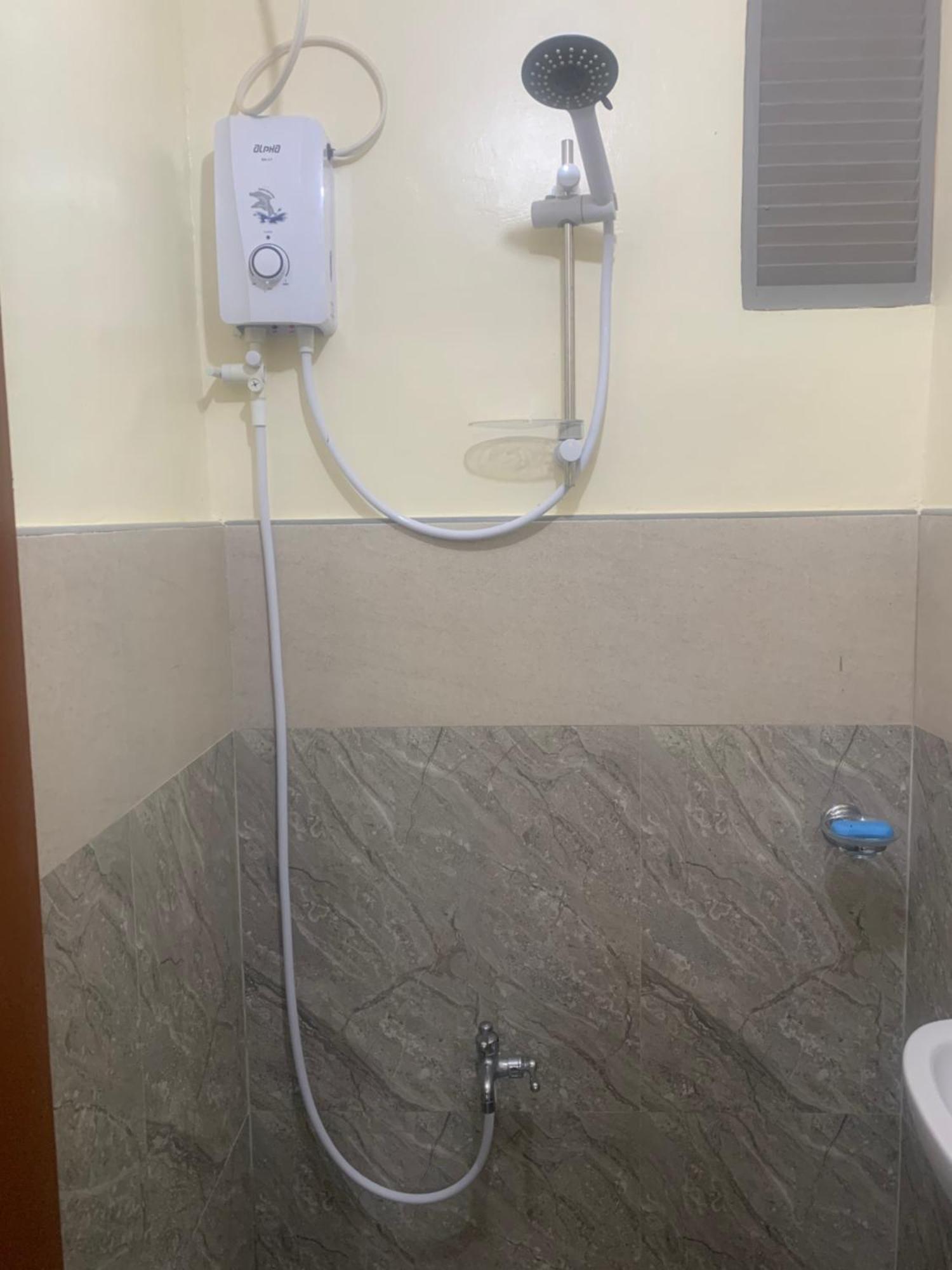 Zl Travelers Inn Batuan Dış mekan fotoğraf